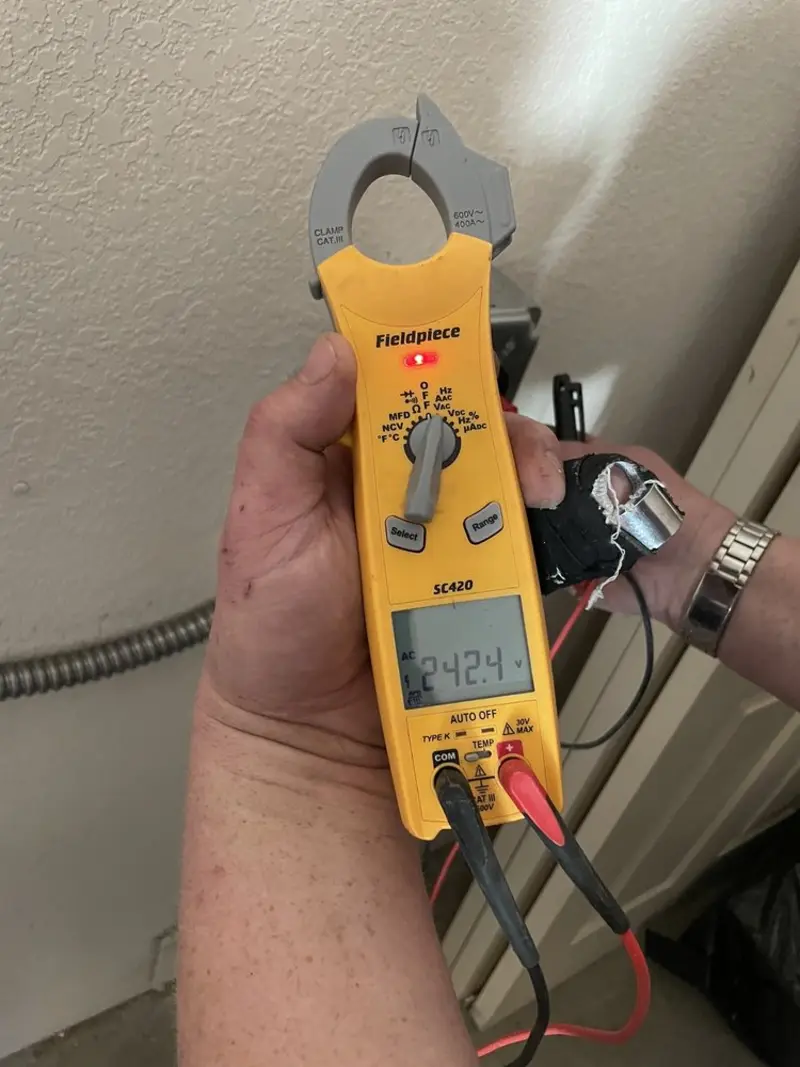 Voltage testing with clamp meter during Ceiling Fan Installation in Unionville